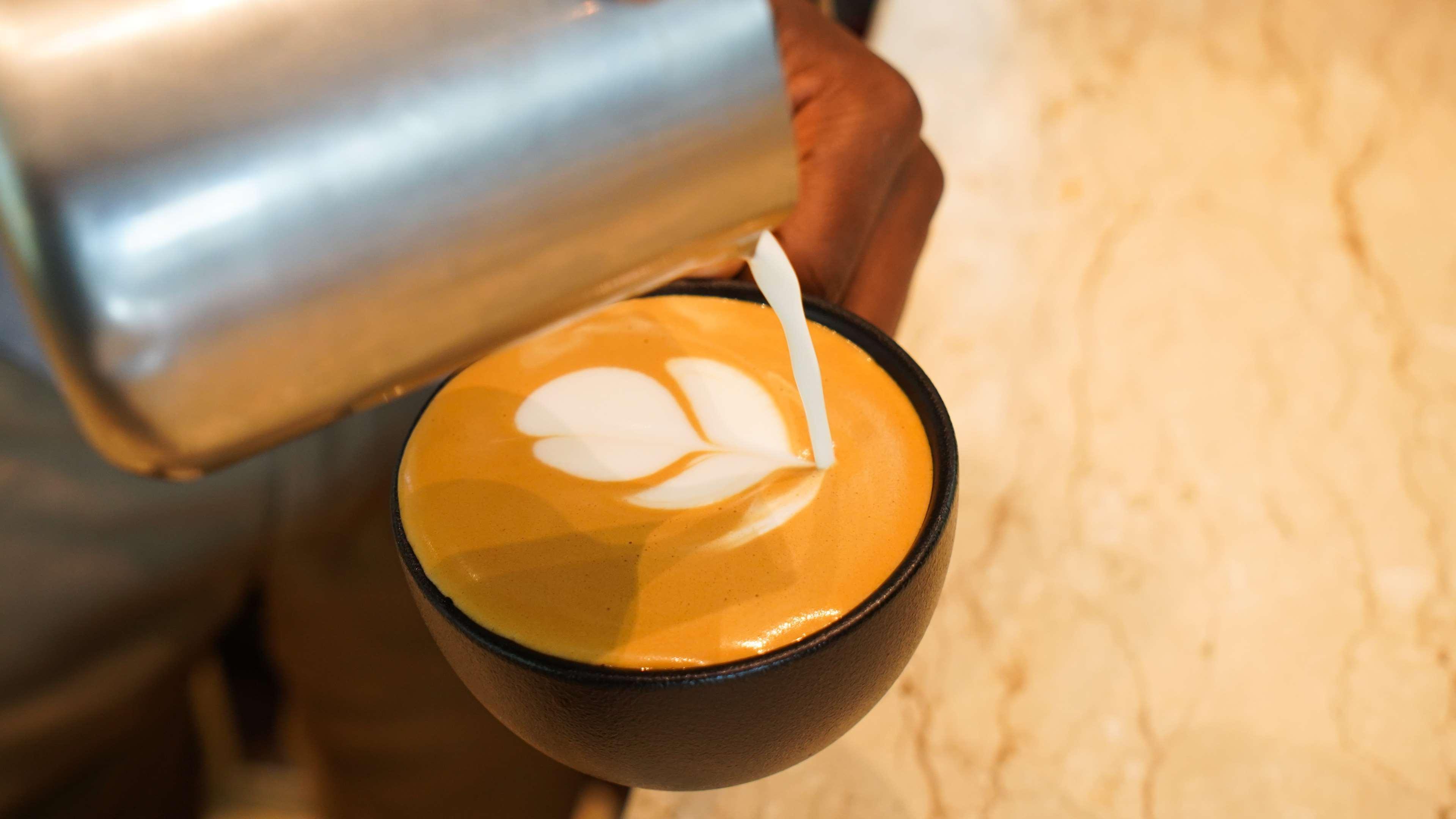 Radisson Blu Hotel & Residence Nairobi Arboretum Exterior photo A cup of coffee