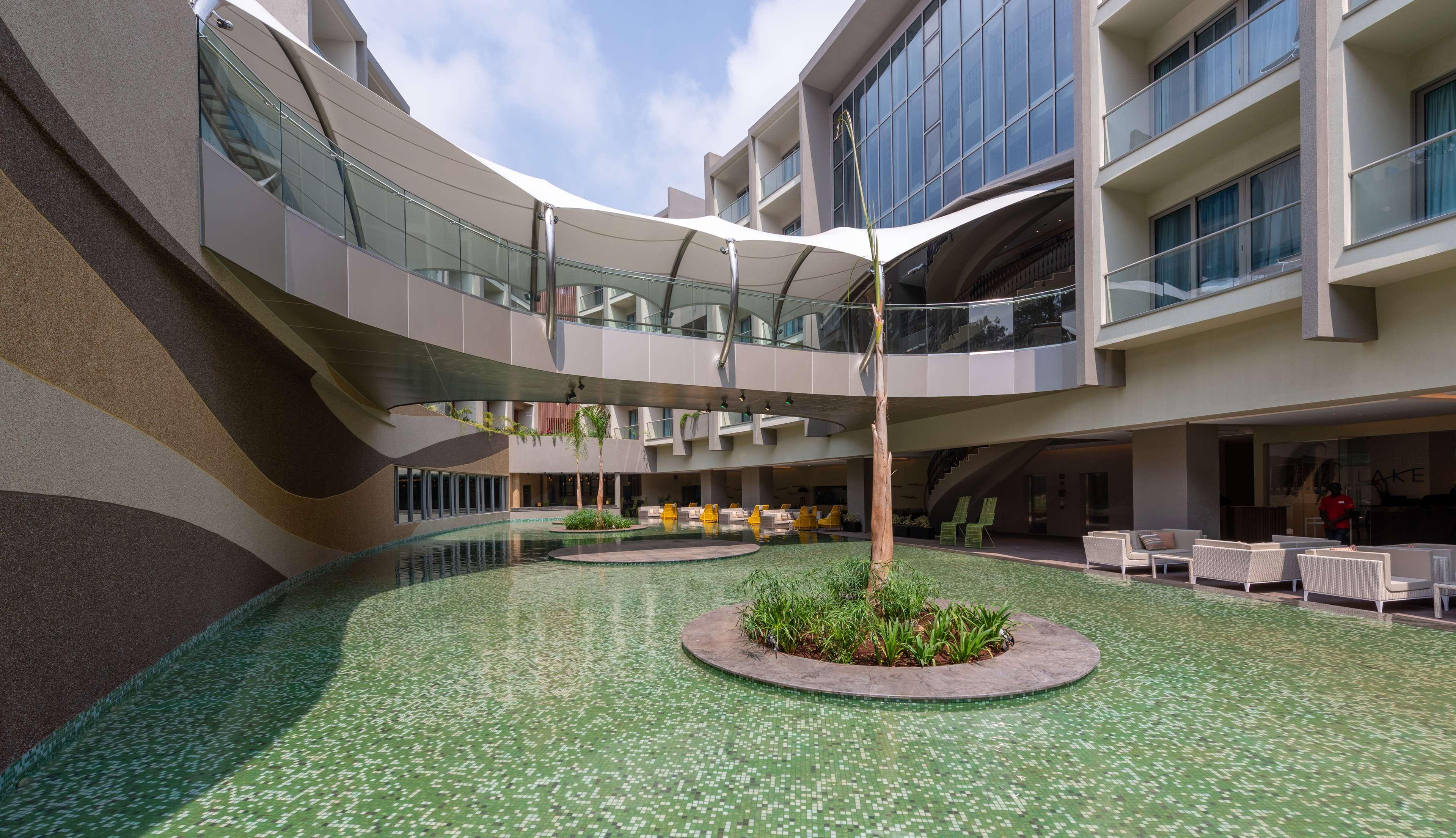 Radisson Blu Hotel & Residence Nairobi Arboretum Exterior photo The courtyard of the hotel