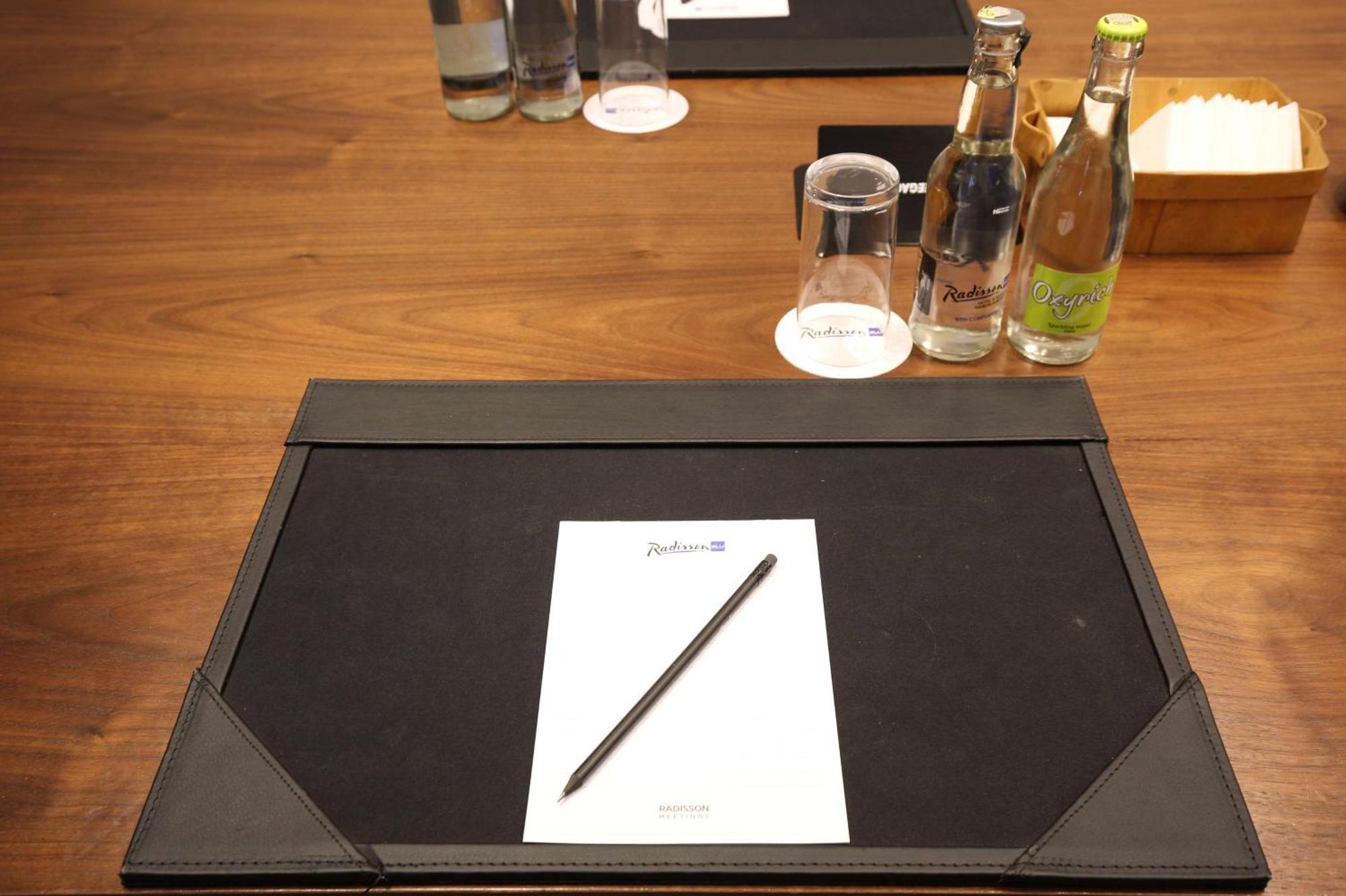Radisson Blu Hotel & Residence Nairobi Arboretum Exterior photo A leather desk pad