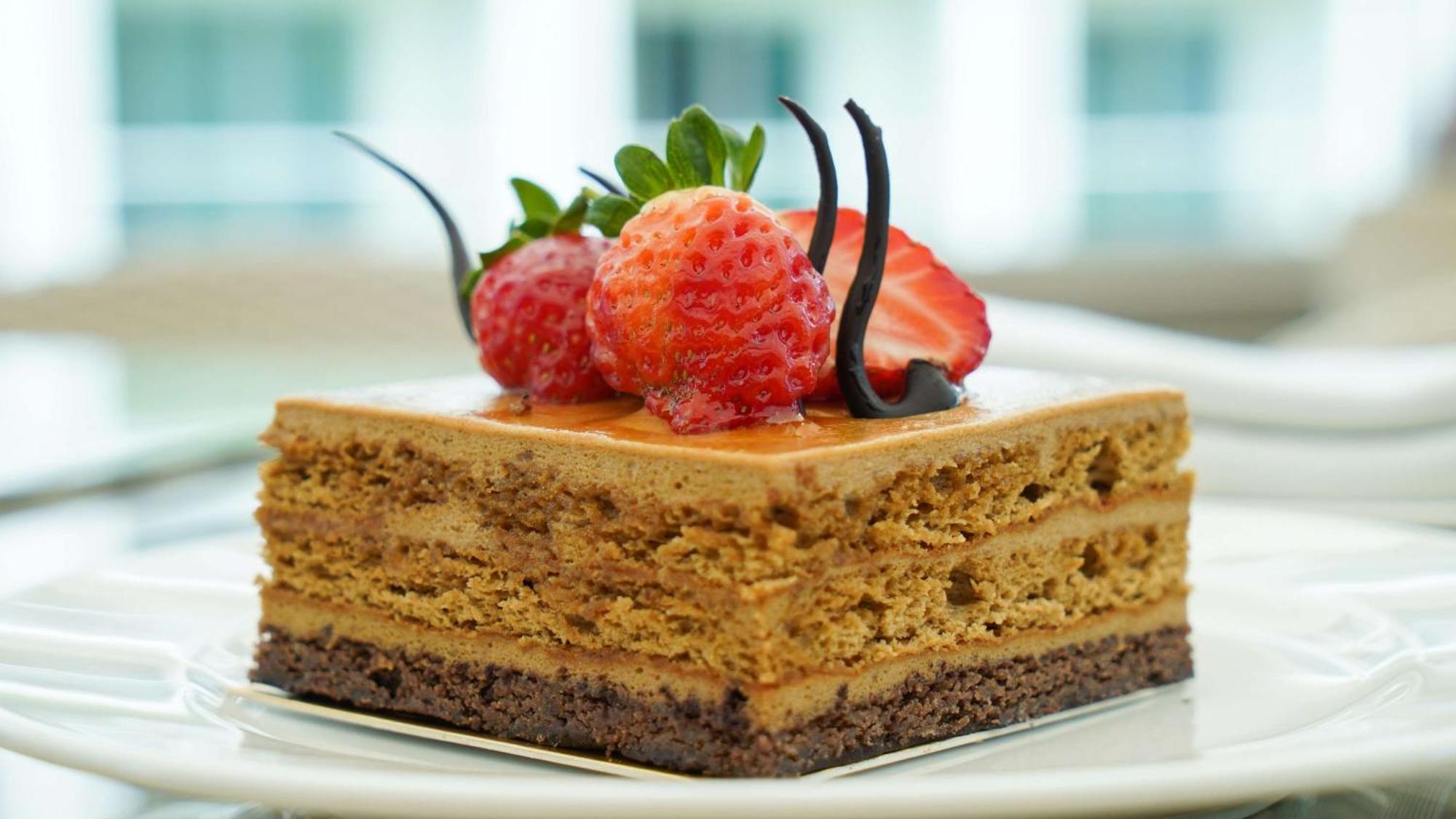 Radisson Blu Hotel & Residence Nairobi Arboretum Exterior photo A piece of chocolate cheesecake