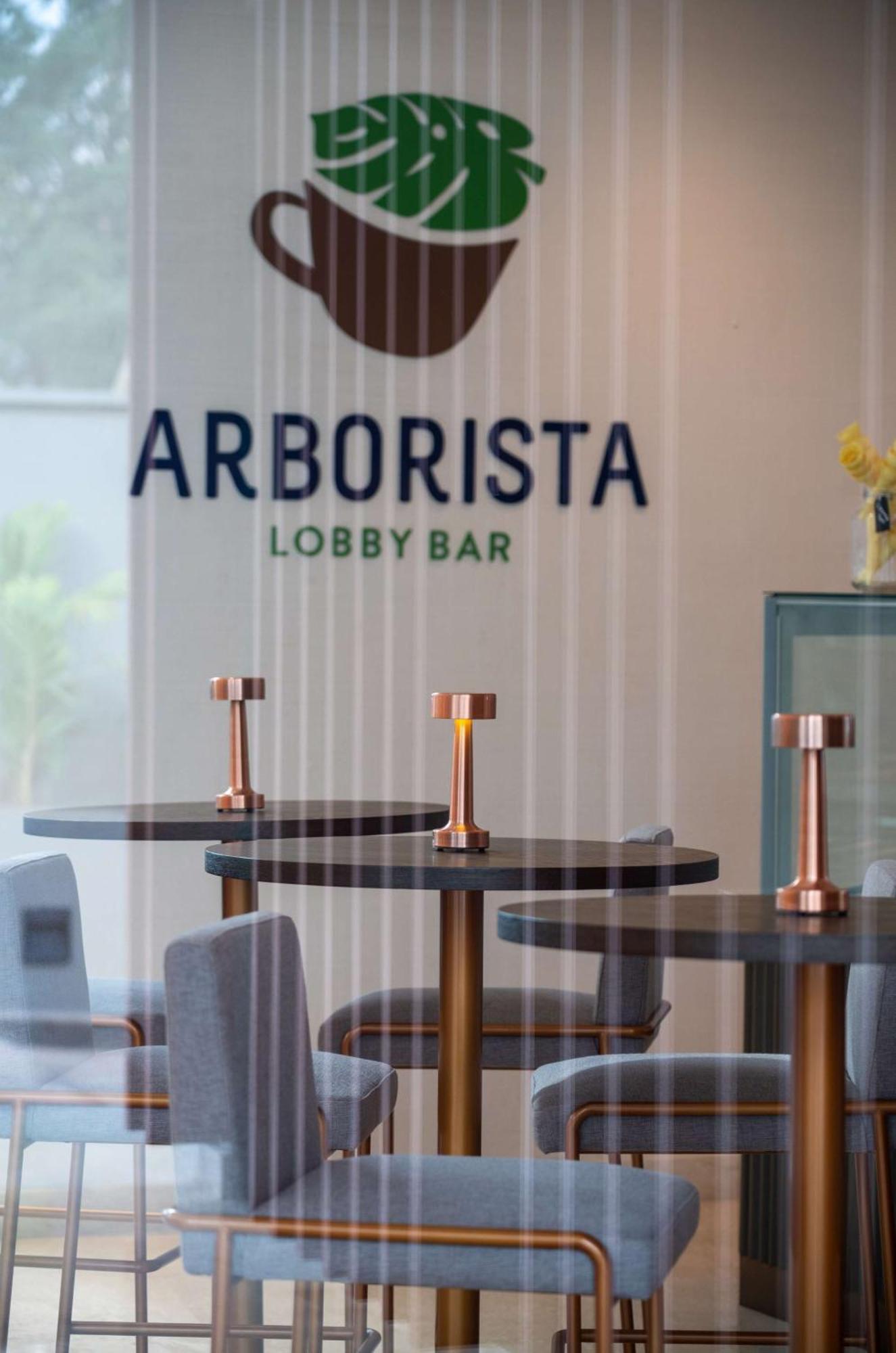 Radisson Blu Hotel & Residence Nairobi Arboretum Exterior photo Arborista, the lobby bar at the hotel