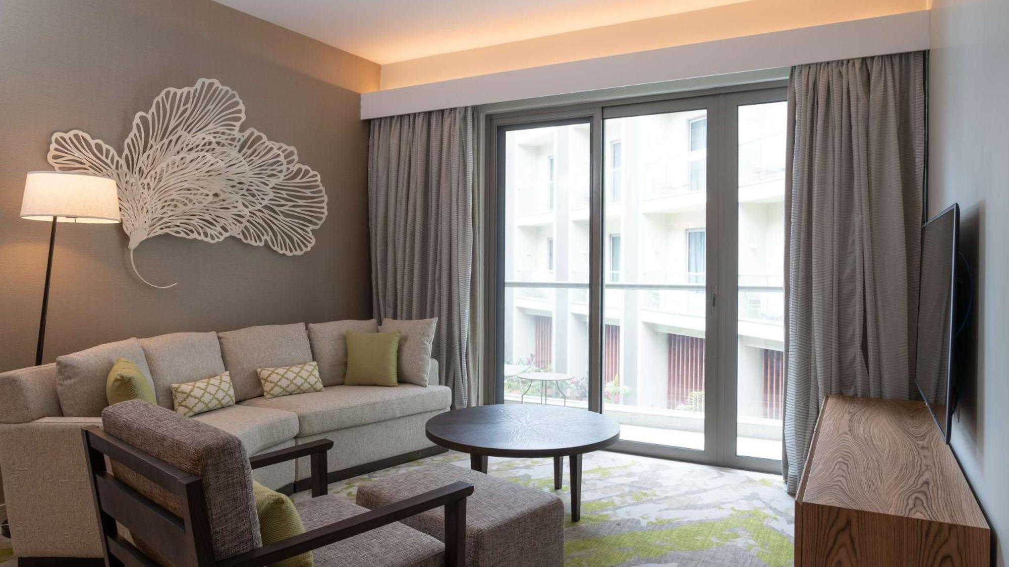 Radisson Blu Hotel & Residence Nairobi Arboretum Exterior photo A living room in a hotel suite